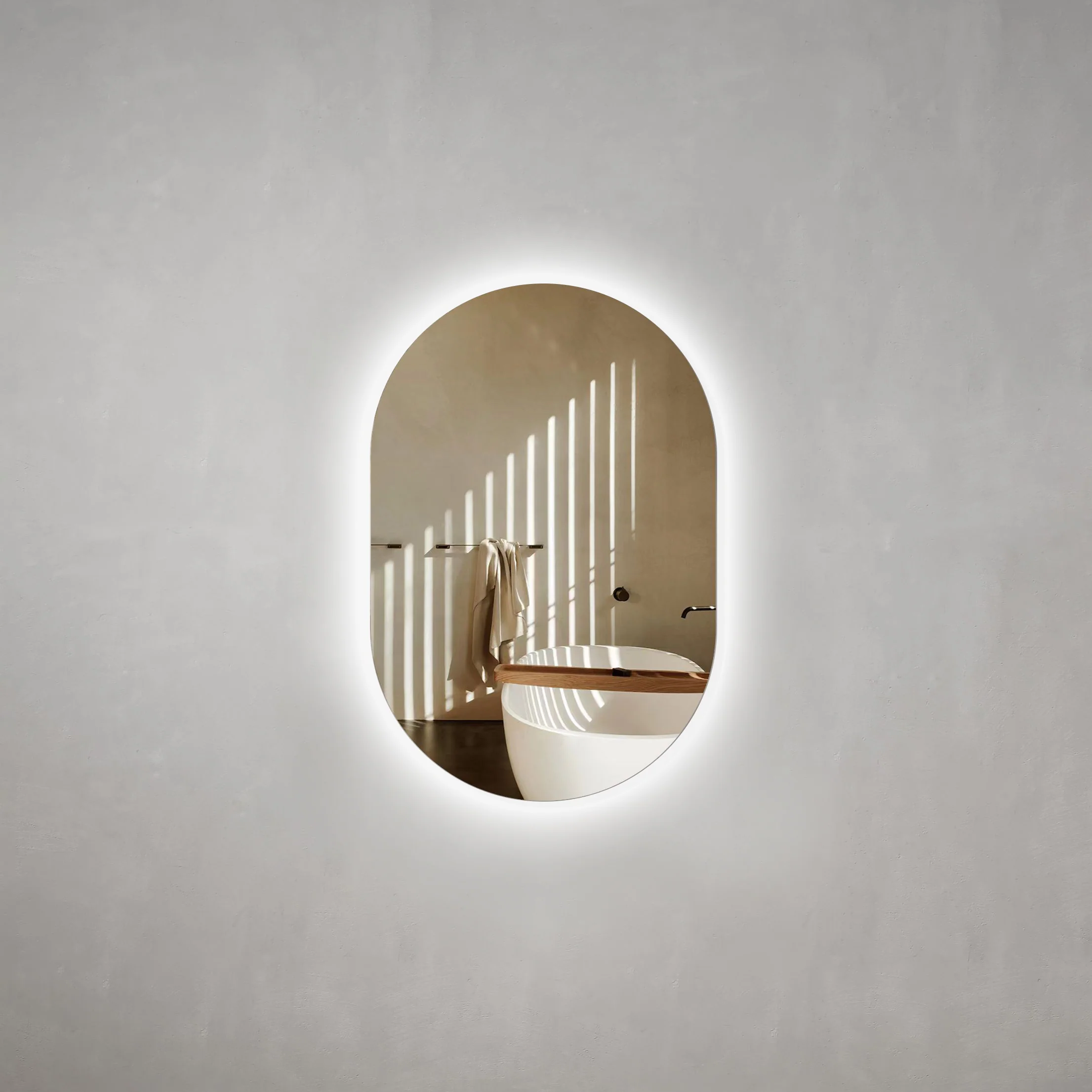 Pill Oval 600mm x 900mm Backlit LED Frameless Mirror with Polished Edge and Demister - Image 3
