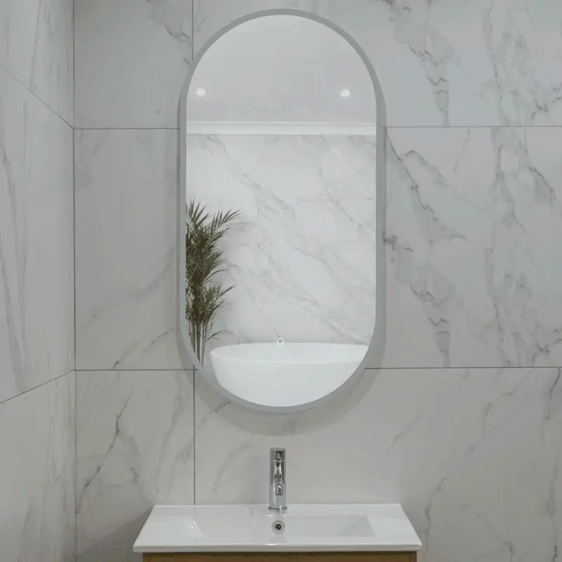 Pill Oval 500mm x 1000mm Frontlit and Backlit LED Frameless Mirror with Frosted Glass Border and Demister - Image 4